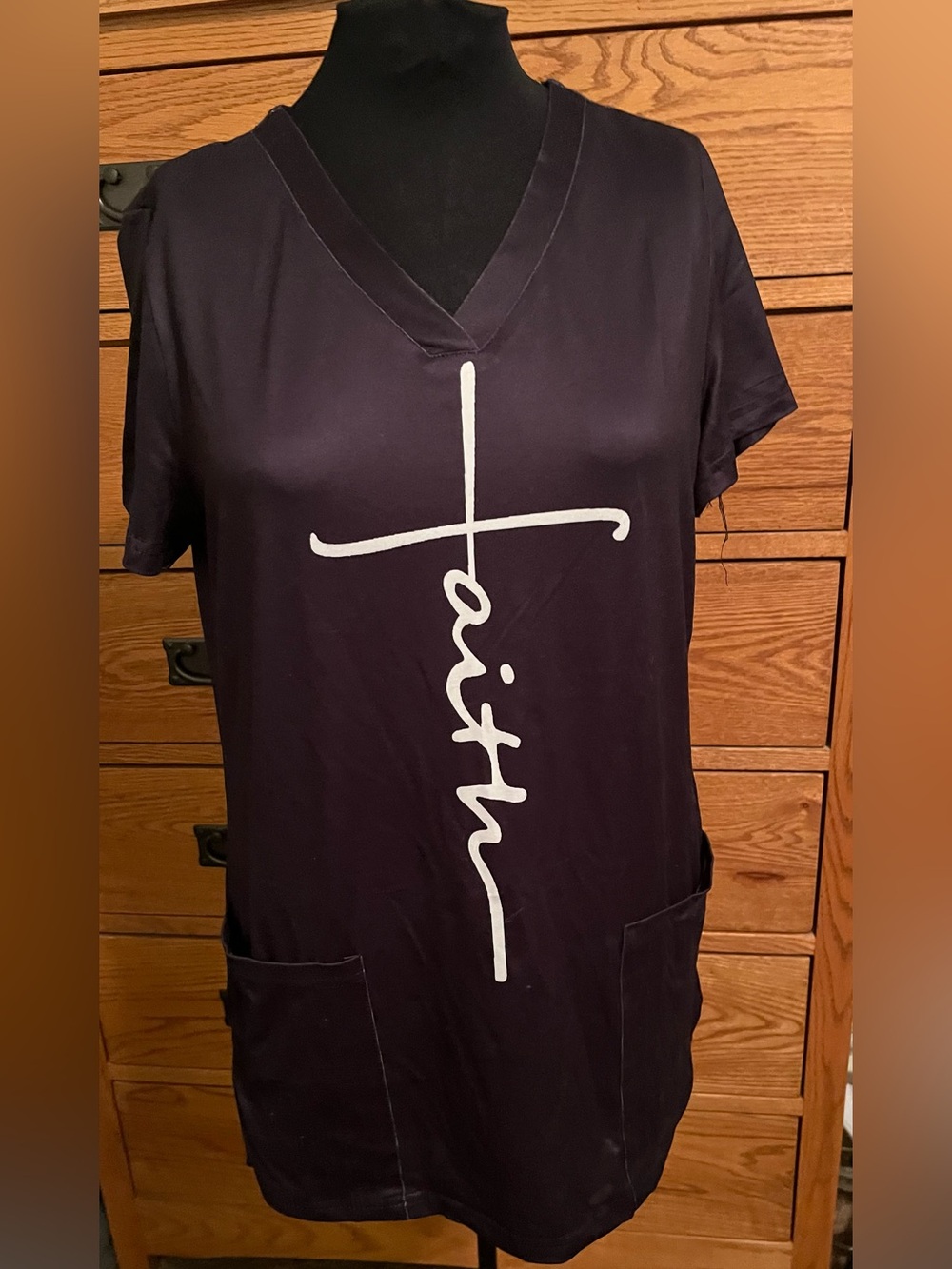 Faith Graphic V-Neck Tunic Top with Pockets in Black with White Script